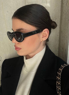 Belinda sunglasses styled for vacation-ready looks.